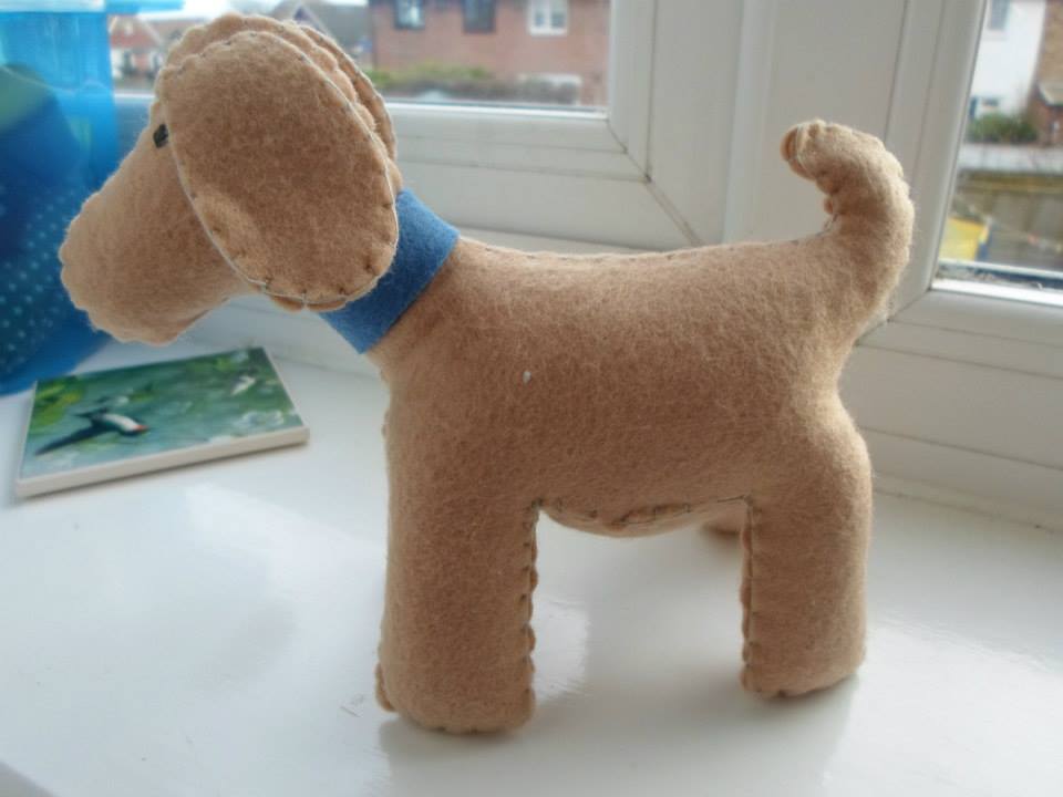 Handmade felt dog donated by Calico and Cotton